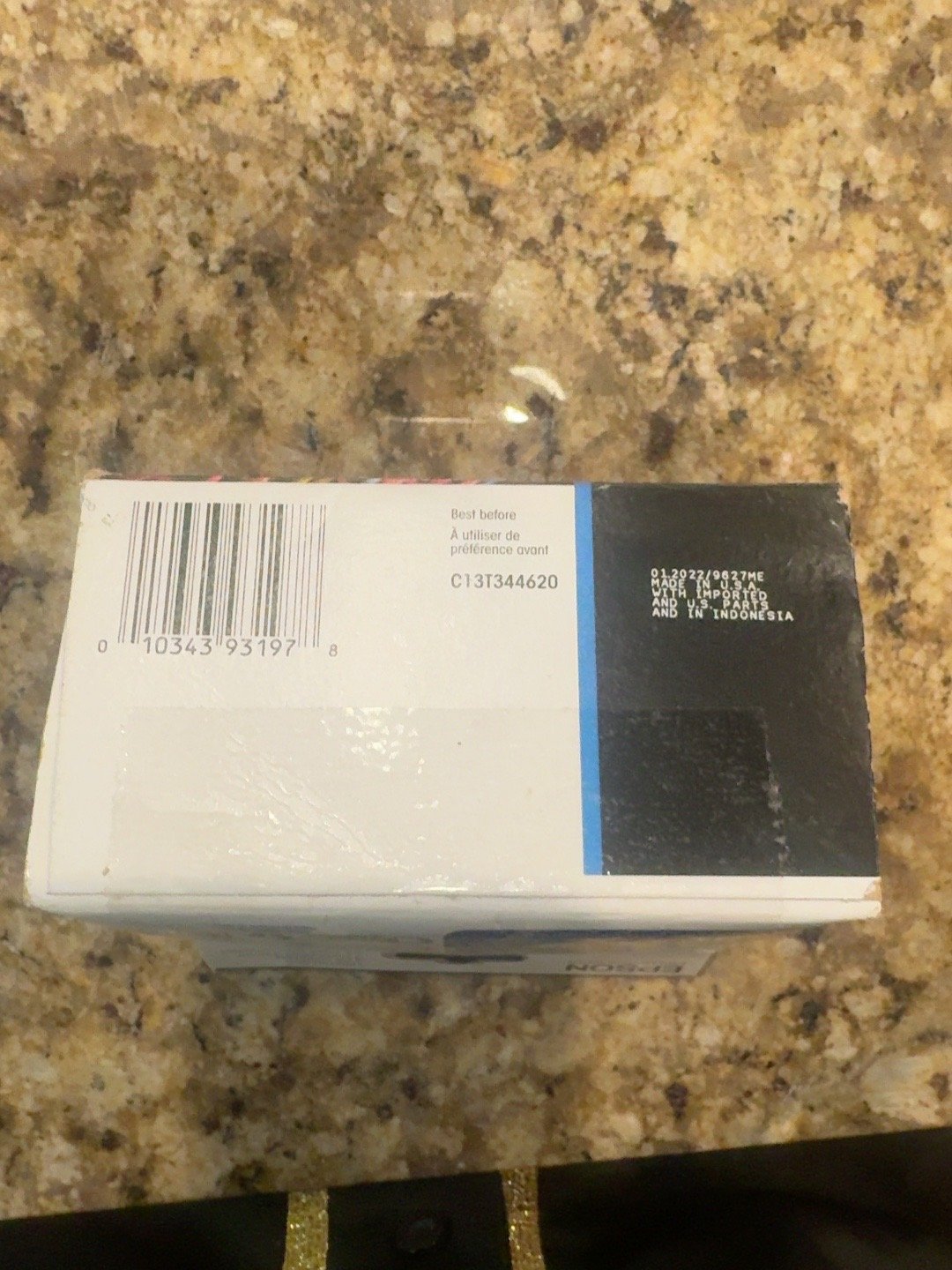 Actual Epson 702 box showing UPC 010343931978 and best-before 01/2022